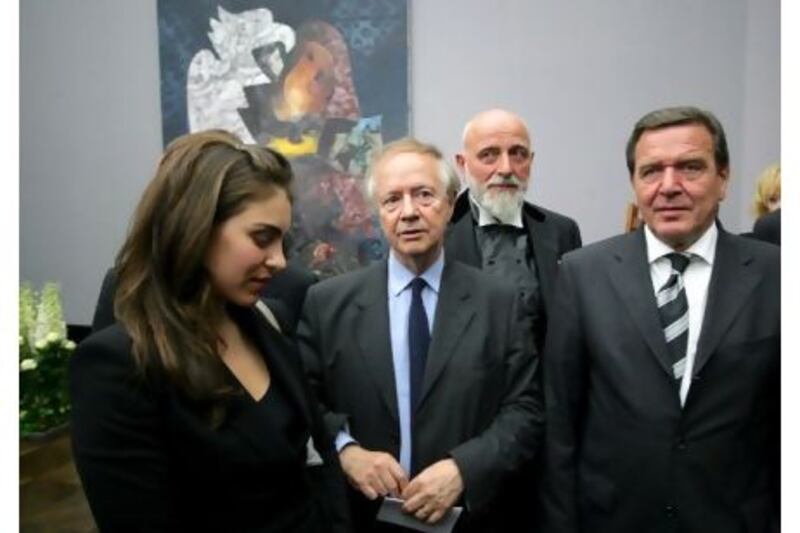 The art historian Werner Spies - above, second from left, he stands alongside the German chancellor Gerhard Schroeder at the funeral in 2007 of the painter Joerg Immendorf - was fooled by the forgeries. Johannes Eisele / EPA