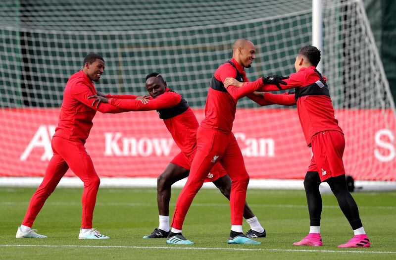 Left to right: Georginio Wijnaldum, Sadio Mane, Fabinho and Roberto Firmino. PA