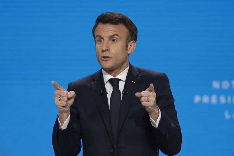 French President Emmanuel Macron spells out his election polices in Aubervilliers, Paris, on March 17. AFP