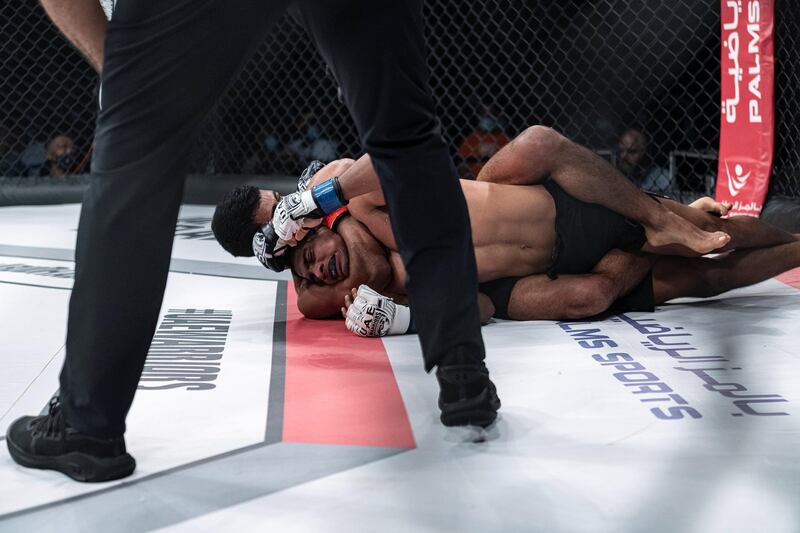 Omar Al Hussaini has Mohamed Sahabdeen held with a rear naked choke in the UAE Warriors 19 Arabia 3 at the Jiu-Jitsu Arena on Friday, June 18, 2021. Courtesy UAE Warriors