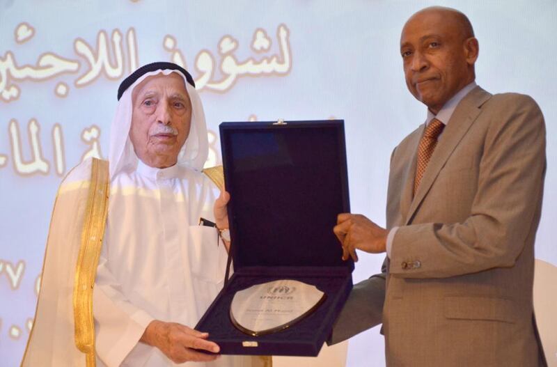 Juma Al Majid receives the “UNHCR Humanitarian Champion” award by Amin Awad, Director of UNHCR’s Bureau for the Middle East and North Africa. Wam