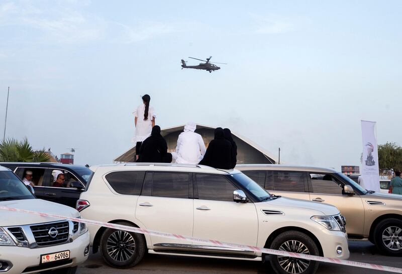 FUJAIRAH, UNITED ARAB EMIRATES - People watching from the street of  the Fourth Union Fortress, Fujairah.  Leslie Pableo for The National for Ruba Haza���s story