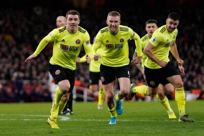 epa08139029 Sheffield United's John Fleck (L) celebrates after scoring during the English Premier League soccer match between Arsenal and Sheffield United at the Emirates Stadium, London, Britain, 18 January 2020.  EPA/WILL OLIVER EDITORIAL USE ONLY. No use with unauthorized audio, video, data, fixture lists, club/league logos or 'live' services. Online in-match use limited to 120 images, no video emulation. No use in betting, games or single club/league/player publications.