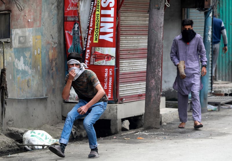 In Srinagar, Indian policemen fired tear gas to disperse Kashmiri Muslim protesters. Farooq Khan / EPA
