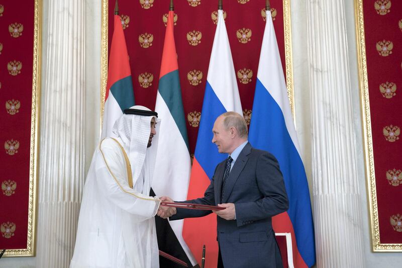 MOSCOW, RUSSIA - June 01, 2018: HH Sheikh Mohamed bin Zayed Al Nahyan, Crown Prince of Abu Dhabi and Deputy Supreme Commander of the UAE Armed Forces (L) and  HE Vladimir Putin Vladimirovich, President of Russia (R) exchange documents after the signing of a memorandum of understanding, at the Kremlin Palace.

( Mohamed Al Hammadi / Crown Prince Court - Abu Dhabi )
---
