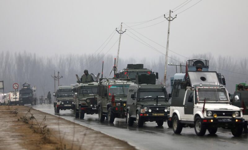 Indian security vehicles at the site of the blast in Lethpora area of south Kashmir's Pulwama  district some 20 kilometers from Srinagar, the summer capital of Indian Kashmir.  EPA