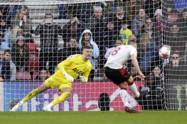 Southampton's James Ward-Prowse scores their side's third goal of the game from a penalty during the Premier League match at St Mary's Stadium, Southampton. Picture date: Saturday March 18, 2023.