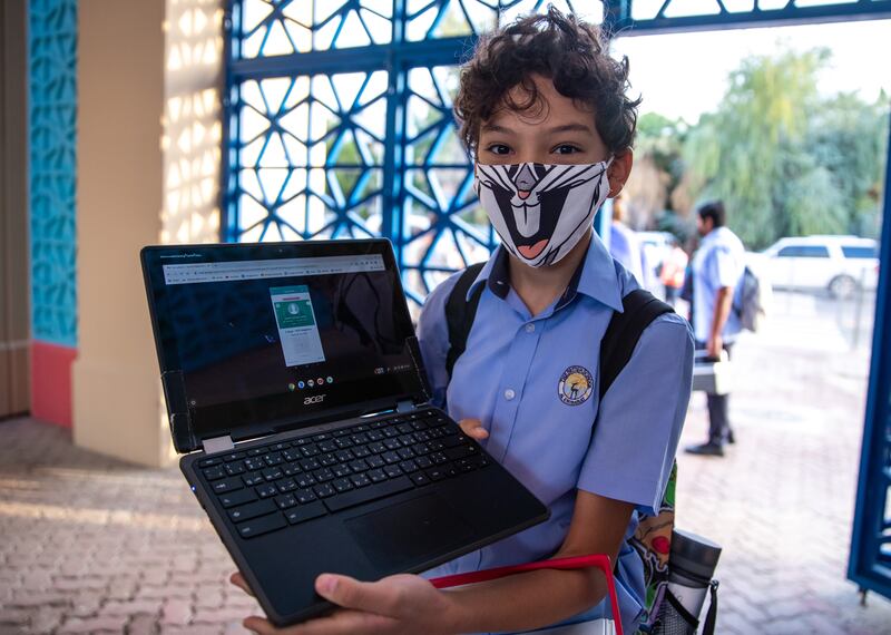 A pupil gets set for in-person teaching at The British School Al Khubairat. Victor Besa / The National