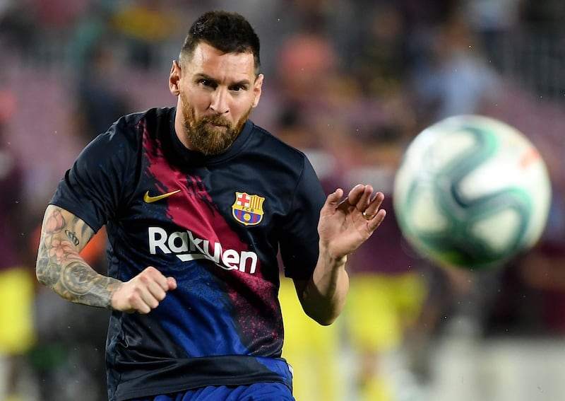 Barcelona's Argentine forward Lionel Messi warms up before the La Liga match against Villarreal at Camp Nou on Tuesday. AFP