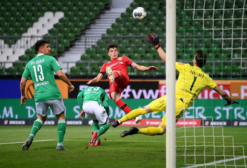 WERDER BREMEN 1 BAYER LEVERKUSEN 4. Leverkusen's Kai Havertz scores the opening goal at the Weserstadion on May 18, 2020. AFP