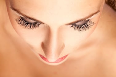 Don't pull your eyelash extensions off as you risk damaging your natural lashes. iStock