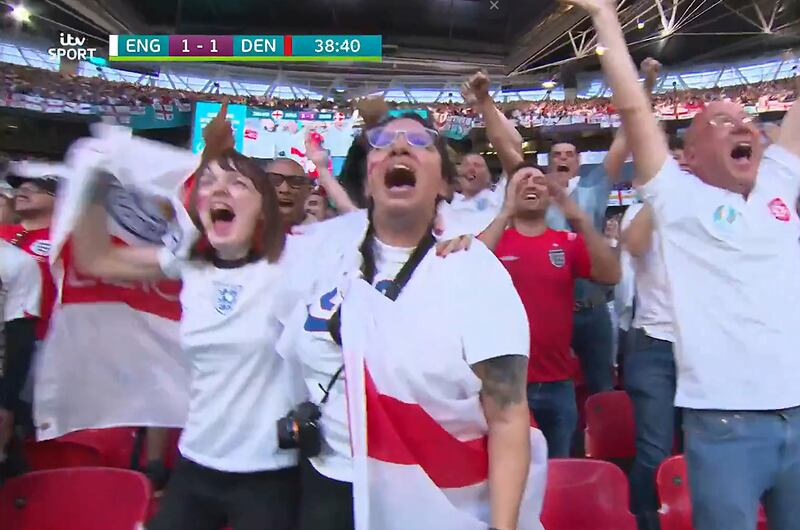 England fan Nina Farooqi celebrates a goal at Wembley. Twitter