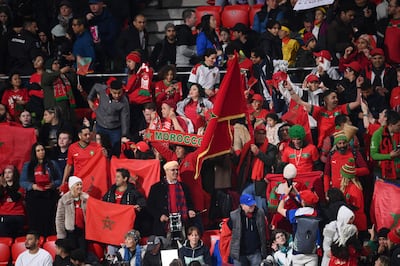 Morocco fans cheer on the team during the match against France. AFP