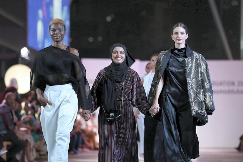 Dubai, United Arab Emirates - June 20, 2019: Designs by student designer Riza Abdullah (M), the dual bridal street wear. Esmod Fashion Show. Thursday the 20th of June 2019. City Walk, Dubai. Chris Whiteoak / The National