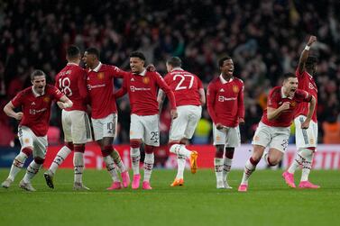 Manchester United players celebrate after winning the English FA Cup semifinal soccer match between Brighton and Hove Albion and Manchester United at Wembley Stadium in London, Sunday, April 23, 2023.  (AP Photo / Kirsty Wigglesworth)