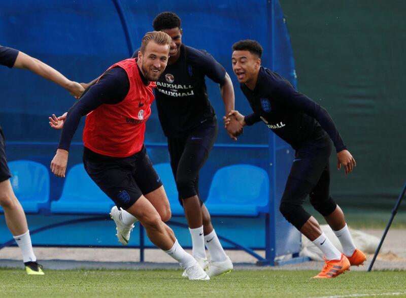 England's Harry Kane with Jesse Lingard and Marcus Rashford during training REUTERS / Lee Smith