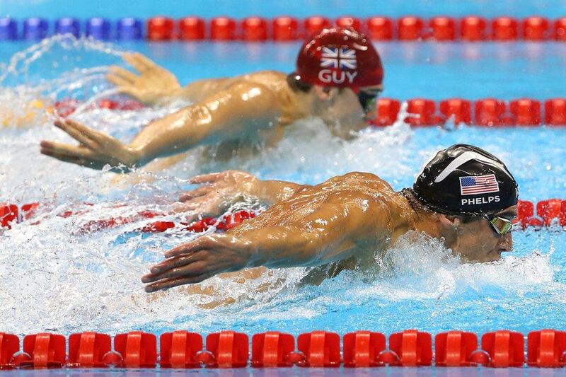 Michael Phelps of the United States leads James Guy of Great Britain in the men’s 4x100m medley relay final on Day 8 of the Rio 2016 Olympic Games at the Olympic Aquatics Stadium on August 13, 2016 in Rio de Janeiro, Brazil. Al Bello / Getty Images