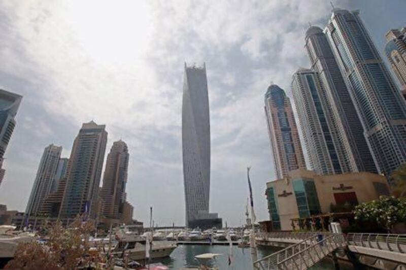 Another landmark: Infinity Tower on Dubai Marina, which turns 90 degrees, is, at 306 metres, the tallest "twisted" tower in the world. The building will officially be inaugurated tonight. Ali Haider / EPA