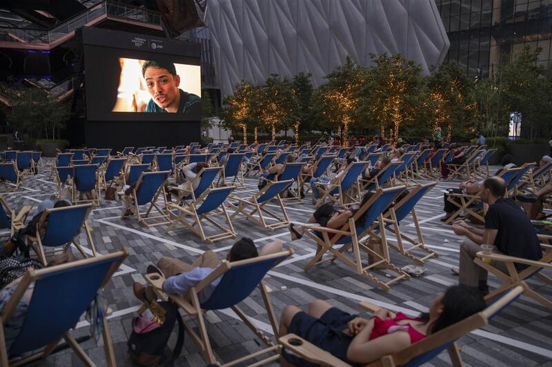 Moviegoers watch a screening of 'In the Heights' at the Tribeca Festival in Hudson Yards. Bloomberg