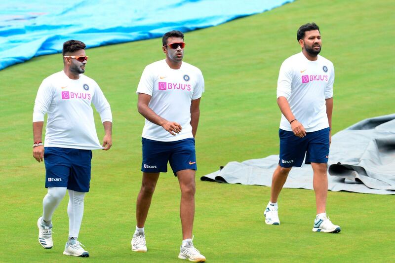 Indian cricketers (L to R) Rishabh Pant, Ravichandran Ashwin and Rohit Sharma walk during a practice session ahead of the first test match between India and South Africa at the Dr. Y.S. Rajasekhara Reddy ACA-VDCA Cricket Stadium in Visakhapatnam on September 30, 2019. The first test match between India and South Africa will start on October 2. - ----IMAGE RESTRICTED TO EDITORIAL USE - STRICTLY NO COMMERCIAL USE----- 
 / AFP / NOAH SEELAM / ----IMAGE RESTRICTED TO EDITORIAL USE - STRICTLY NO COMMERCIAL USE----- 
