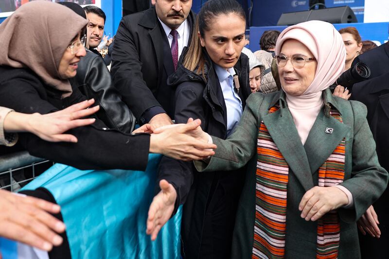 Emine Erdogan, the President's wife, greets his supporters in Ankara on Sunday.  AFP