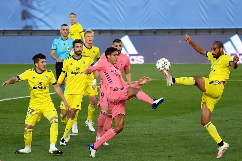 Cadiz defender Fali, right, vies with Real Madrid defender Raphael Varane. AFP