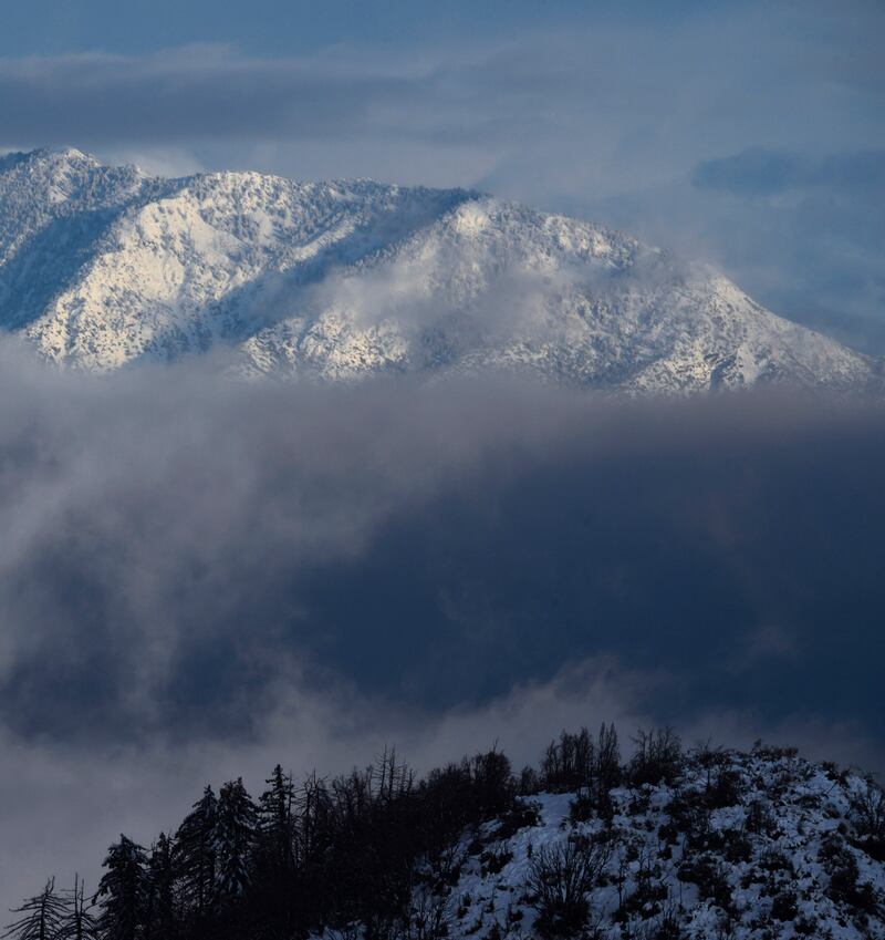 Mount Baldy partly obscured by low clouds. AFP