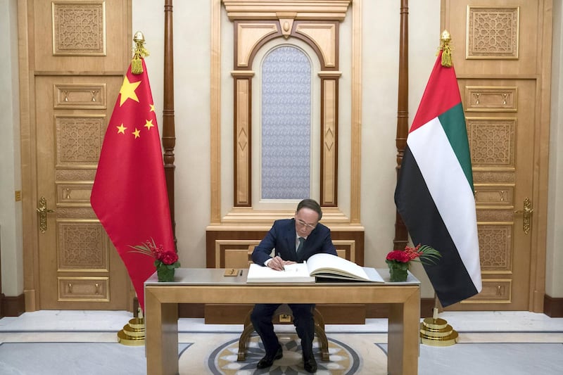 ABU DHABI, UNITED ARAB EMIRATES -October 29, 2018: HE Wang Qishan, Vice President of China (C) signs a guest book, at the Presidential Palace. 

( Mohamed Al Hammadi / Crown Prince Court - Abu Dhabi )
---