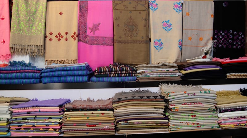Shawls for sale in a shop in Islampur
