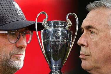 FILE PHOTO (EDITORS NOTE: COMPOSITE OF IMAGES - Image numbers 1168582506,464313758, 1342484846 - GRADIENT ADDED) In this composite image a comparison has been made between Jurgen Klopp, Manager of Liverpool (L) and Carlo Ancelotti, Head Coach of Real Madrid. Liverpool and Real Madrid meet in the UEFA Champions League Final at the Stade de France on May 28,2022 in Paris, France ***LEFT IMAGE*** OUTHAMPTON, ENGLAND - AUGUST 17: Jurgen Klopp, Manager of Liverpool looks on prior to the Premier League match between Southampton FC and Liverpool FC at St Mary's Stadium on August 17, 2019 in Southampton, United Kingdom. (Photo by Catherine ) ***CENTER IMAGE*** MANCHESTER, ENGLAND - FEBRUARY 24: The Champions league trophy is seen prior to the UEFA Champions League Round of 16 match between Manchester City and Barcelona at Etihad Stadium on February 24, 2015 in Manchester, United Kingdom. (Photo by Laurence ) ***RIGHT IMAGE*** MADRID, SPAIN - SEPTEMBER 25: Carlo Ancelotti, Head Coach of Real Madrid looks on prior to the La Liga Santander match between Real Madrid CF and Villarreal CF at Estadio Santiago Bernabeu on September 25, 2021 in Madrid, Spain. (Photo by Denis Doyle / Getty Images)