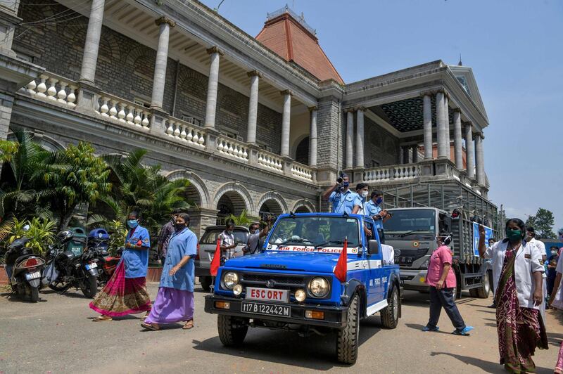 A Indian Air Force convoy drives past the Victoria Hospital in Bangalore. AFP