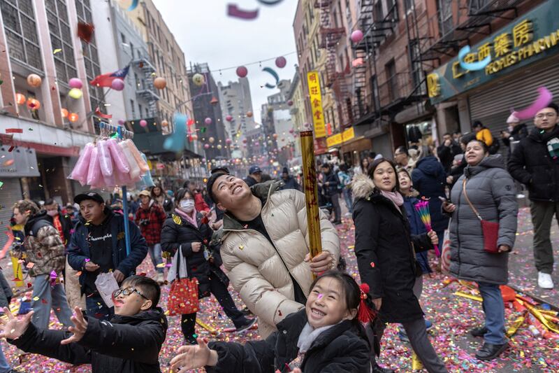 People celebrate the year of the Rabbit during the Lunar New Year Parade in Chinatown in New York. Reuters

