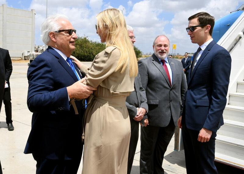 White House senior advisor Ivanka Trump greets US Ambassador to Israel David Friedman as she stands near White House Senior Advisor Jared Kushner, upon their arrival at the Ben Gurion International Airport, near Lod, Israel, on May 13, 2018. Courtesy David Azagury/U.S. Embassy Tel Aviv