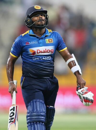 Sri Lanka's Dilshan Munaweera leaves the field after dismissal during their second day of T20 cricket match against Pakistan in Abu Dhabi, United Arab Emirates, Friday, Oct. 27, 2017. (AP Photo/Kamran Jebreili)