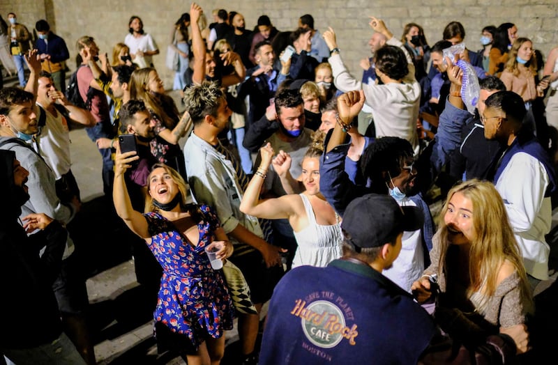 Dancing in the street in the Barcelona neighbourhood of Born, as a coronavirus curfew is lifted across most of Spain on Saturday night. Reuters