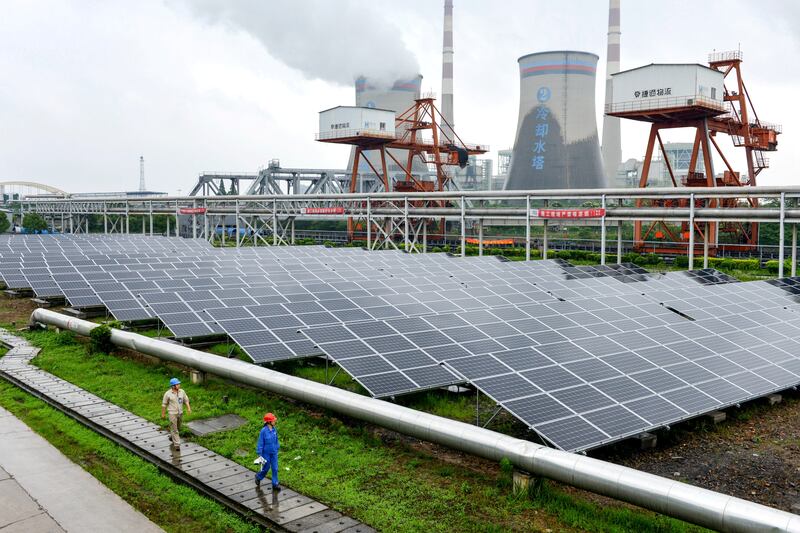 A solar power plant in Zhejiang Province. China controls more than 80 per cent of global solar panel manufacturing. Reuters
