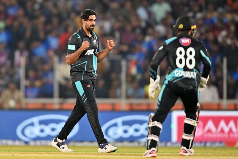 New Zealand's Ish Sodhi celebrates after the dismissal of India's Rahul Tripathi. AFP