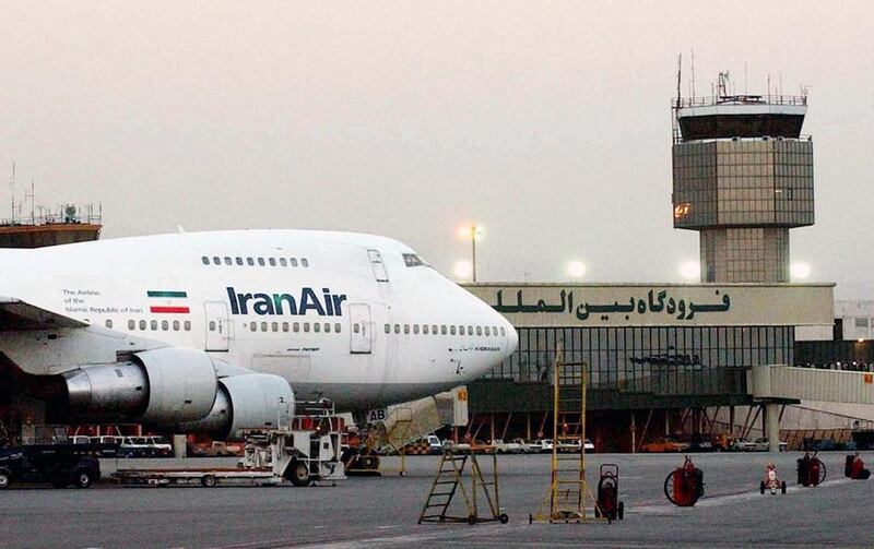 A Boeing 747 owned by Iran's national airline at Mehrabad International Airport. Tehran is awaiting a decision by the US on export licences to enable it to buy new planes. Hasan Sarbakhshian / AP