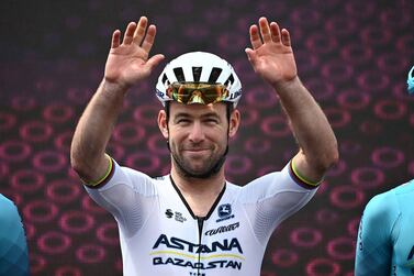 British rider Mark Cavendish of Astana Qazaqstan Team greets spectators during the signing in ahead of the sixth stage of the 2023 Giro d'Italia cycling race, over 162km around Naples, Italy, 11 May 2023.   EPA / LUCA ZENNARO