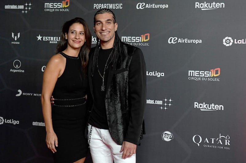 Barcelona's former goalkeeper Jose Manuel Pinto poses with his wife Elena Gross on the red carpet. AFP