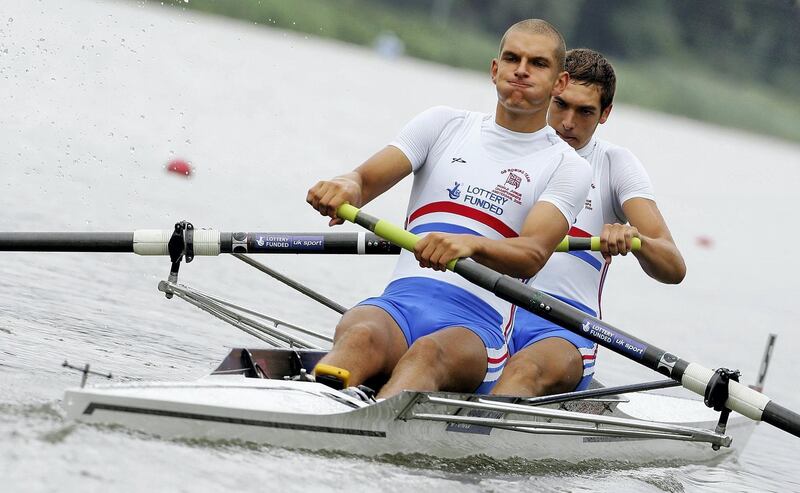 AMSTERDAM, NETHERLANDS - AUGUST 02:  Mohamed Sbihi (front) and Charles Cousins of Great Britain row during their junior men's pair heat during the World Rowing Junior Championships on the Bosbann river on August 2, 2006 in Amsterdam, Holland.  (Photo by Jamie McDonald/Getty Images)