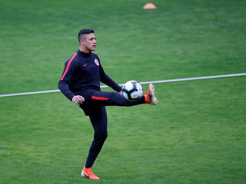 Chile forward Alexis Sanchez attends a training session at EPACCT Frederico Antonio Germano Menzen, Sao Paulo, Brazil. Reuters