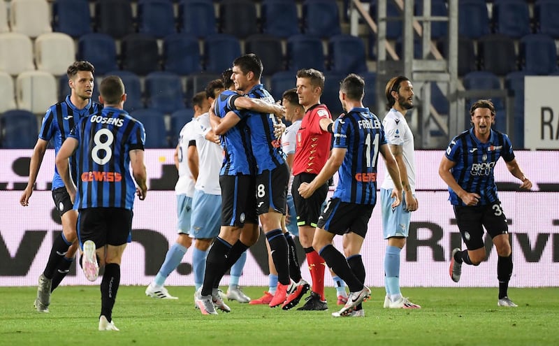 Atalanta's Ruslan Malinovskyi celebrates scoring his team's second goal. Reuters