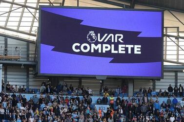 The giant screen signals to the referee, players and crowd at the Etihad Stadium, for Manchester City's clash with Tottenham Hotspur in August, that a VAR check over a disputed Gabriel Jesus goal has been completed. The goal was chalked off. Getty 