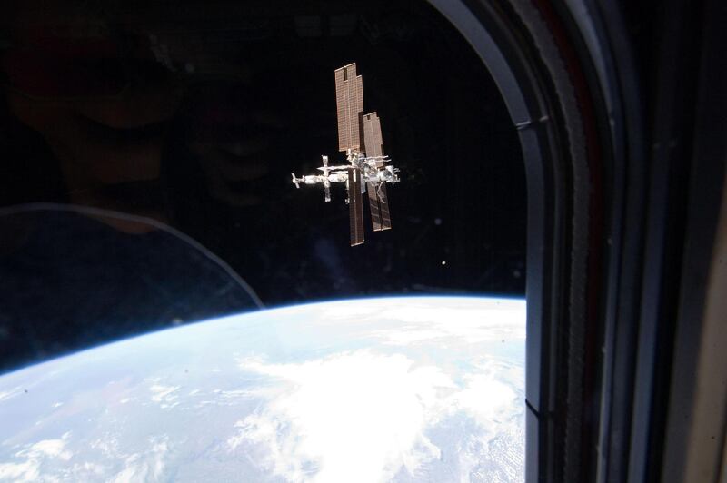 This image provided by NASA of the International Space Station was taken by a member of Atlantis' STS-135 crew during a fly around as the shuttle departed the station on Tuesday, July 19, 2011. STS-135 is the final shuttle mission to the orbital laboratory. NASA is ending its shuttle program with Atlantis' successful space station resupply mission. It is the 135th flight in shuttle history. (AP Photo/NASA) *** Local Caption ***  Space Shuttle.JPEG-0966b.jpg