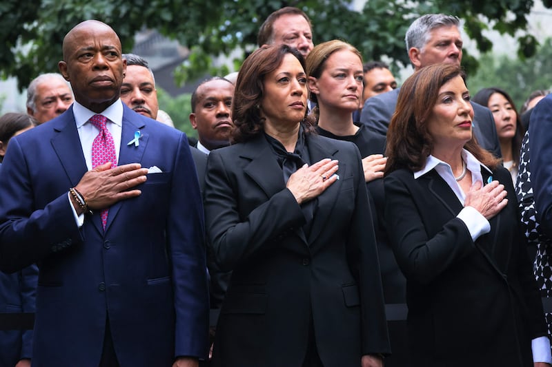 NEW YORK, NEW YORK - SEPTEMBER 11: New York Mayor Eric Adams, Vice President Kamala Harris, and New York Gov.  Kathy Hochul place their hands on their heart as the National Anthem is sung during the annual 9/11 Commemoration Ceremony at the National 9/11 Memorial and Museum on September 11, 2023 in New York City.  Family and friends honored the lives of their loved ones on the 22nd anniversary of the terror attacks of September 11, 2001, at the World Trade Center, Shanksville, PA and the Pentagon, that killed nearly 3,000 people.    Michael M.  Santiago/Getty Images/AFP (Photo by Michael M.  Santiago  /  GETTY IMAGES NORTH AMERICA  /  Getty Images via AFP)