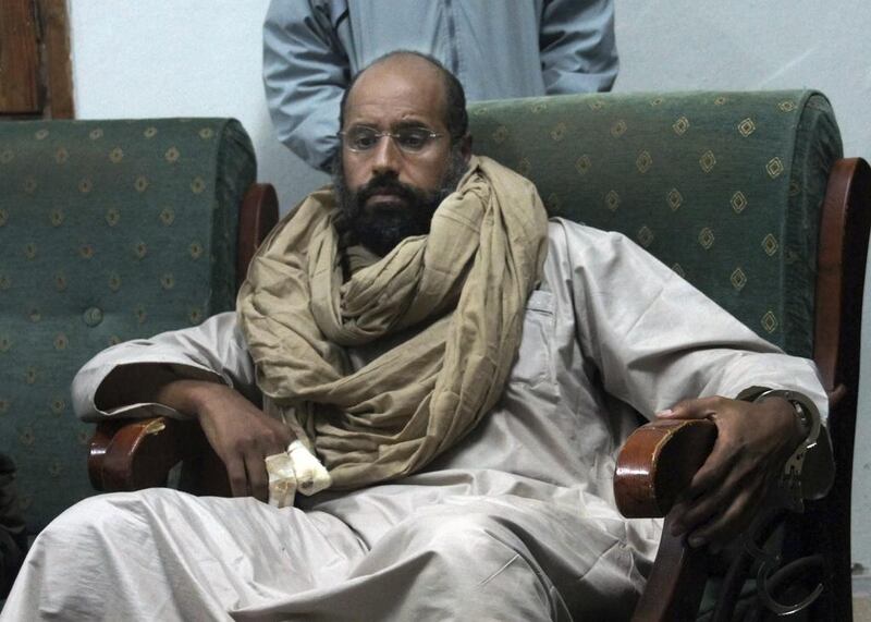 Saif Al Islam Qaddafi does not want to leave Libya and securing him inside the country is not an easy task given the chaos and lack of security that persists. They declined to disclose his whereabouts, citing concerns over his safety. Ammar El Darwish / AP Photo
