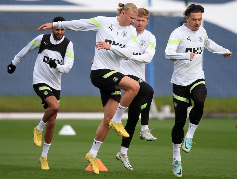 Riyad Mahrez, left, Erling Haaland and Jack Grealish. AFP