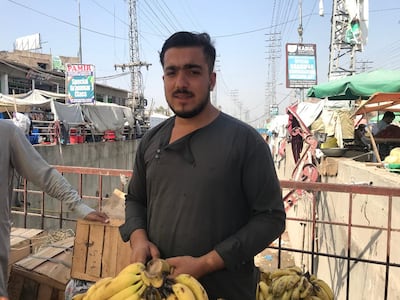 Afghan Refugees in Pakistan Board Bazaar. Farhad Khan