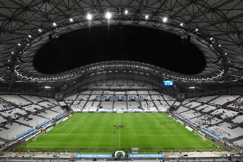 (FILES) This file photograph taken on October 20, 2019, shows a general view of The Velodrome Stadium prior to the French L1 football match between Olympique de Marseille (OM) and Racing Club de Strasbourg Alsace (RCS) in Marseille, southern France. The three suspected cases of Covid-19 (novel coronavirus) within the Olympique de Marseille team have been confirmed, the club announced on Twitter on August 18, 2020, threatening the holding of the opening match of Ligue 1 on August 21, against Saint-Etienne. / AFP / Boris HORVAT
